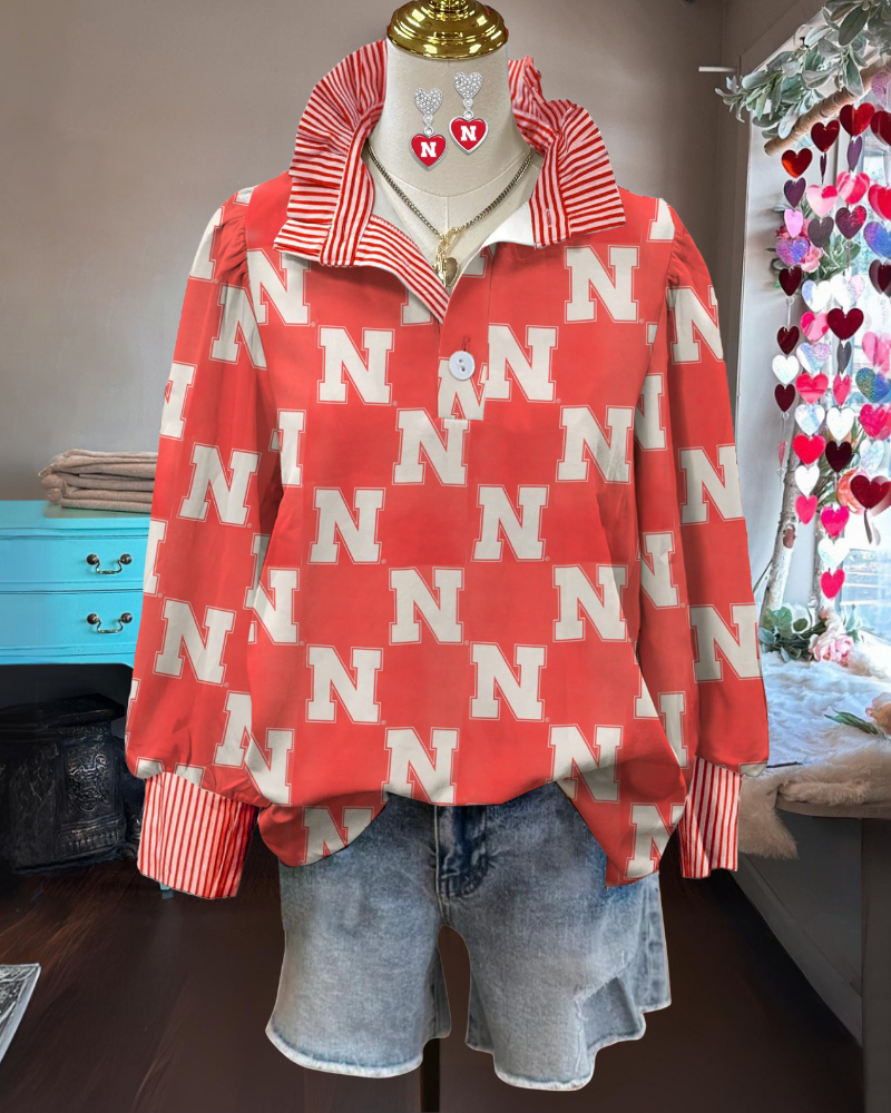 Nebraska Ruffle Stripe Trim Top